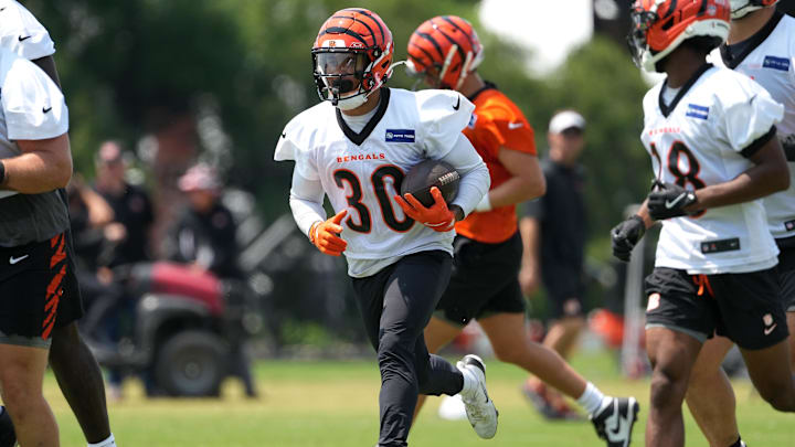 Jun 10, 2025; Cincinnati, OH, USA; Cincinnati Bengals running back Chase Brown (30) carries the ball during practice at Paycor Stadium. Mandatory Credit: Kareem Elgazzar-Imagn Images