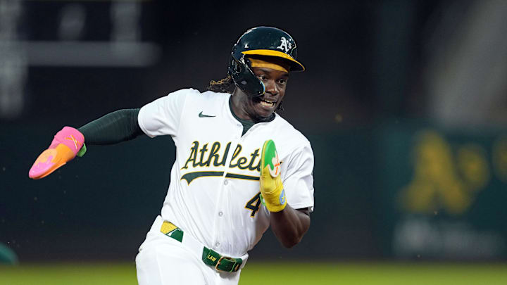 Sep 6, 2024; Oakland, California, USA; Oakland Athletics right fielder Lawrence Butler (4) runs to third base against the Detroit Tigers during the fourth inning at Oakland-Alameda County Coliseum. Sep 6, 2024; Oakland, California, USA; Oakland Athletics right fielder Lawrence Butler (4) runs to third base against the Detroit Tigers during the fourth inning at Oakland-Alameda County Coliseum.