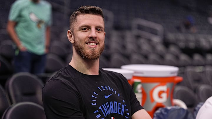 Dec 28, 2024; Charlotte, North Carolina, USA; Oklahoma City Thunder center Isaiah Hartenstein (55) during pregame warmups against the Charlotte Hornets at Spectrum Center.