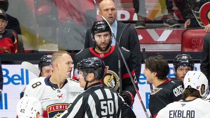 Oct 21, 2026; Ottawa, Ontario, CAN;  Florida Panthers left wing Brady Tkachuk (8) has an exchange with Ottawa Senators center Dylan Cozens (24) in the third period at the Canadian Tire Centre.  Mandatory Credit: Marc DesRosiers-Imagn