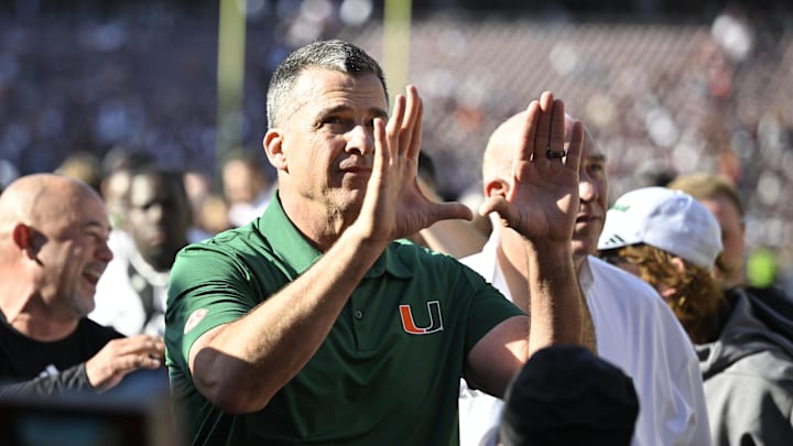 Dec 20, 2025; College Station, TX, USA; Miami Hurricanes head coach Mario Cristobal celebrates after defeating the Texas A&M Aggies in the first round game of the CFP National Playoff at Kyle Field. Mandatory Credit: Jerome Miron-Imagn Images