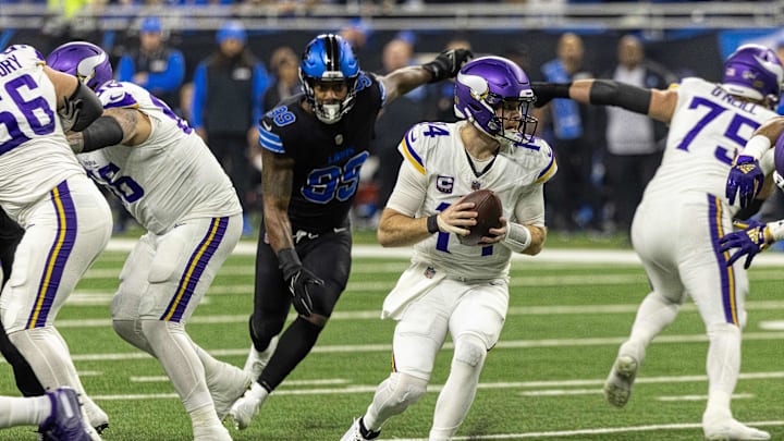 Jan 5, 2025; Detroit, Michigan, USA; Minnesota Vikings quarterback Sam Darnold (14) rolls out of the pocket against the Detroit Lions during the first half at Ford Field. Mandatory Credit: David Reginek-Imagn Images Jan 5, 2025; Detroit, Michigan, USA; Minnesota Vikings quarterback Sam Darnold (14) rolls out of the pocket against the Detroit Lions during the first half at Ford Field. Mandatory Credit: David Reginek-Imagn Images