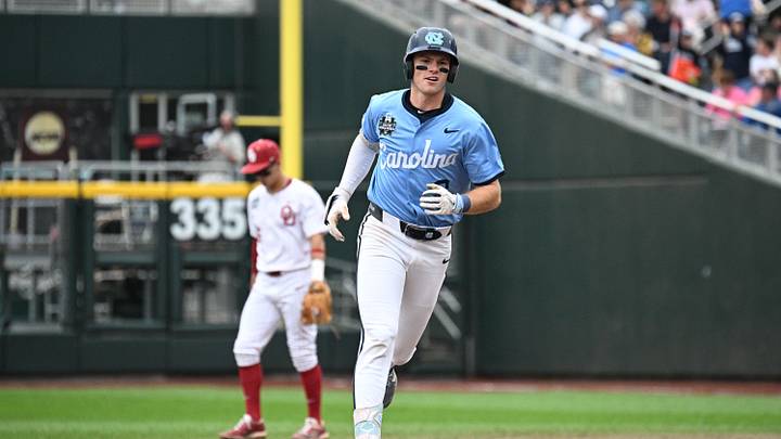 Jun 21, 2026; Omaha, NE, USA;  North Carolina Tar Heels center fielder Owen Hull (8) circles the bases after hitting a home run against the Oklahoma Sooners during the fifth inning at Charles Schwab Field. Mandatory Credit: Steven Branscombe-Imagn Images
