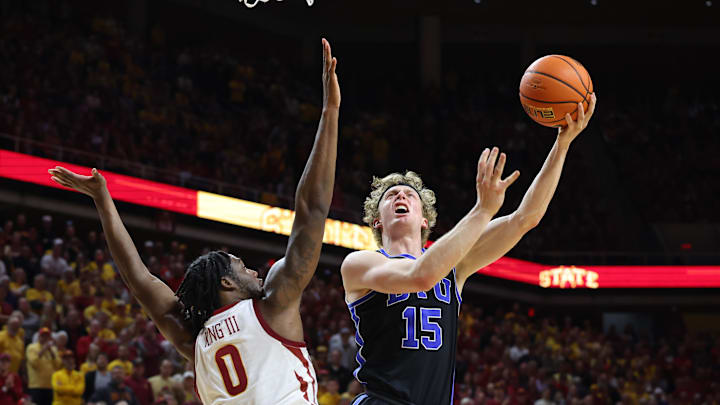 Mar 6, 2024; Ames, Iowa, USA; Iowa State Cyclones forward Tre King (0) defends Brigham Young Cougars guard Richie Saunders (15) in the second half at James H. Hilton Coliseum. Mandatory Credit: Reese Strickland-Imagn Images
Mar 6, 2024; Ames, Iowa, USA; Iowa State Cyclones forward Tre King (0) defends Brigham Young Cougars guard Richie Saunders (15) in the second half at James H. Hilton Coliseum. Mandatory Credit: Reese Strickland-Imagn Images
