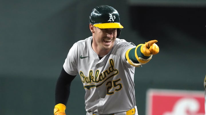 Jun 29, 2024; Phoenix, Arizona, USA; Oakland Athletics outfielder Brent Rooker (25) reacts after hitting a single against the Arizona Diamondbacks in the first inning at Chase Field. Mandatory Credit: Rick Scuteri-USA TODAY Sports Jun 29, 2024; Phoenix, Arizona, USA; Oakland Athletics outfielder Brent Rooker (25) reacts after hitting a single against the Arizona Diamondbacks in the first inning at Chase Field. Mandatory Credit: Rick Scuteri-USA TODAY Sports