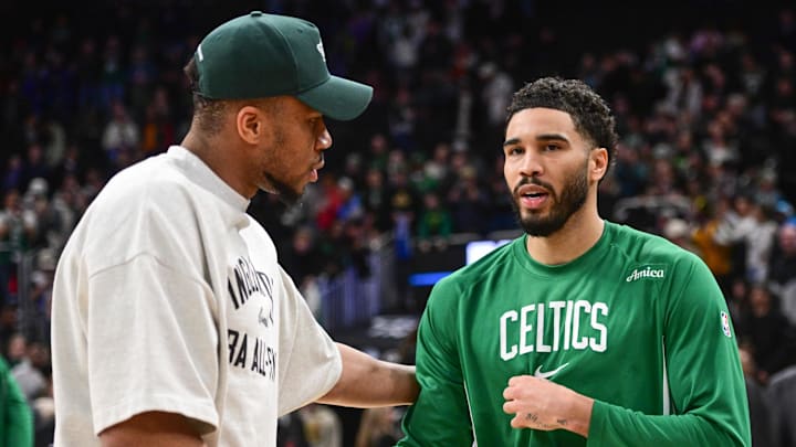 Apr 3, 2026; Milwaukee, Wisconsin, USA; Milwaukee Bucks forward Giannis Antetokounmpo (34) greets Boston Celtics forward Jayson Tatum (0) after the game at Fiserv Forum. Mandatory Credit: Benny Sieu-Imagn Images