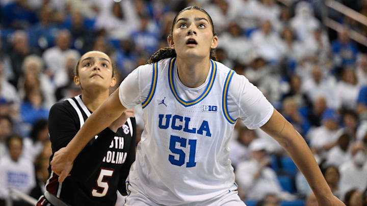 UCLA Bruins center Lauren Betts (51) and South Carolina Gamecocks guard Tessa Johnson (5) during the third quarter at Pauley Pavilion presented by Wescom.
