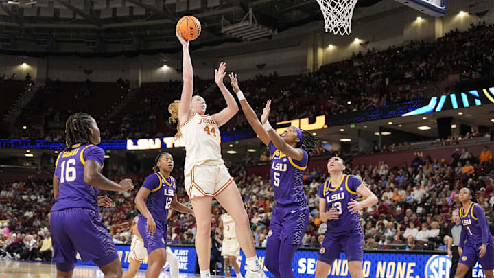 Mar 8, 2025; Greenville, SC, USA; Texas Longhorns forward Taylor Jones (44) shoots over LSU Lady Tigers forward Sa'Myah Smith (5) during the second half at Bon Secours Wellness Arena. Mandatory Credit: Jim Dedmon-Imagn Images Mar 8, 2025; Greenville, SC, USA; Texas Longhorns forward Taylor Jones (44) shoots over LSU Lady Tigers forward Sa'Myah Smith (5) during the second half at Bon Secours Wellness Arena. Mandatory Credit: Jim Dedmon-Imagn Images
