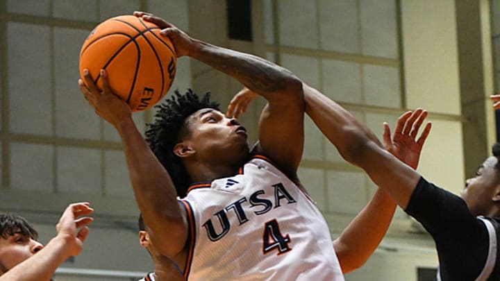 Marcus 'Smurf' Millender goes up for a contested layup vs the Little Rock Trojans.
