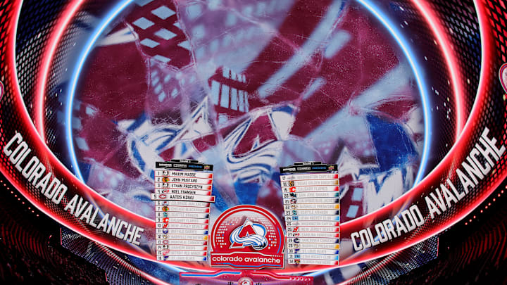 The Colorado Avalanche announce the team's first wave of roster cuts, reassigning four players to different clubs.