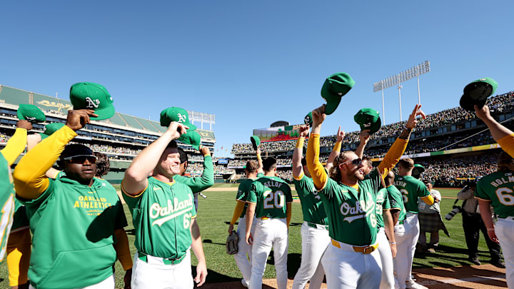 Athletics players saying goodbye to their fans after the team's final game in Oakland