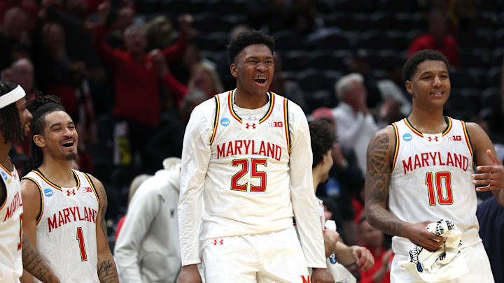 Rodney Rice, Derik Queen, Julian Reese celebrate Maryland's first-round victory in the 2025 March Madness tournament.