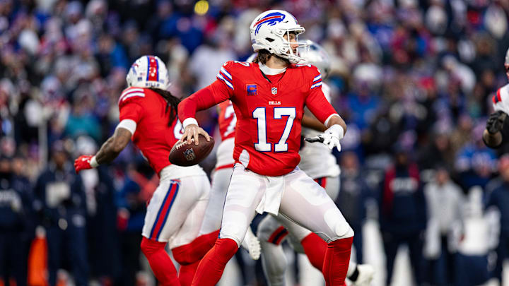 Buffalo Bills quarterback Josh Allen sets to throw against the New England Patriots