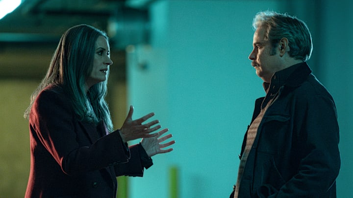 L-R: Paget Brewster as Emily Prentiss and Paul F. Tompkins as Brian Garrity in Criminal Minds: Evolution, episode 3, season 17 streaming on Paramount+, 2024. Photo Credit: Michael Yarish /Paramount+