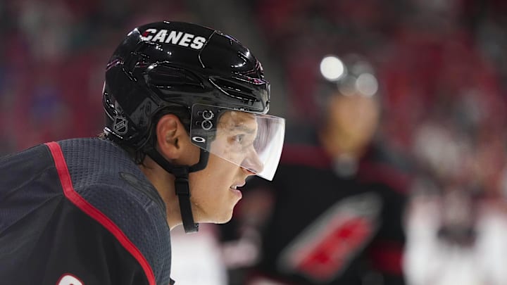 Oct 7, 2018; Raleigh, NC, USA;  Carolina Hurricanes right wing Sebastian Aho (20) looks on during  the game against the New York Rangers at PNC Arena. The Carolina Hurricanes defeated the New York Rangers 8-5. Mandatory Credit: James Guillory-Imagn Images