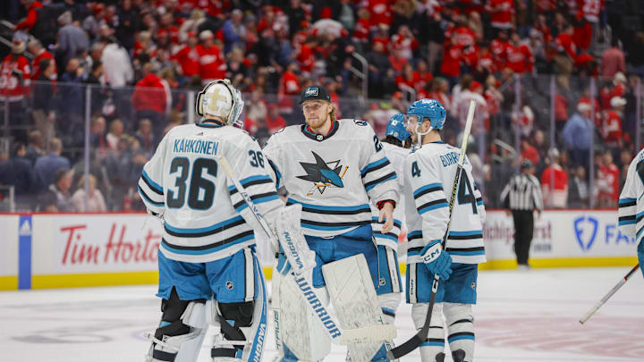 Dec 7, 2023; Detroit, Michigan, USA; San Jose Sharks goalie Mackenzie Blackwood (29) congratulates teammates on comeback win
