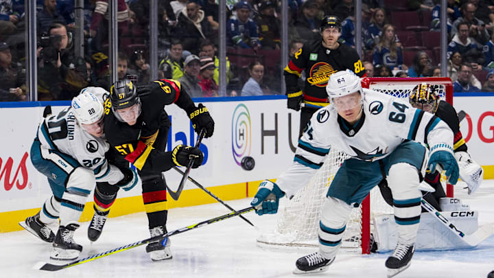 Nov 20, 2023; Vancouver, British Columbia, CAN; San Jose Sharks forward Fabian Zetterlund (20) and