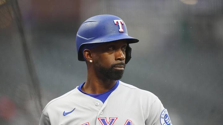 May 19, 2026; Denver, Colorado, USA; Texas Rangers designated hitter Andrew McCutchen (4) on deck in the first inning against the Colorado Rockies at Coors Field. Mandatory Credit: Ron Chenoy-Imagn Images May 19, 2026; Denver, Colorado, USA; Texas Rangers designated hitter Andrew McCutchen (4) on deck in the first inning against the Colorado Rockies at Coors Field. Mandatory Credit: Ron Chenoy-Imagn Images