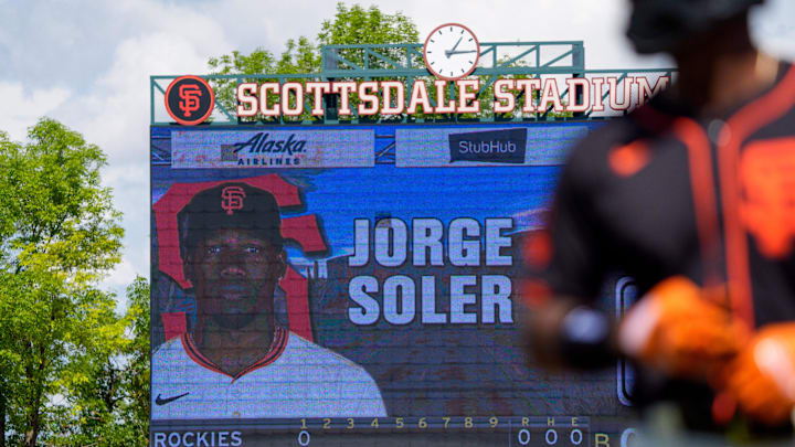 Mar 17, 2024; Scottsdale, Arizona, USA; A detailed view of the scoreboard in the first inning