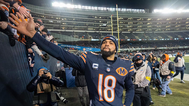 Chicago Bears quarterback Caleb Williams (18) high fives fans after their game Saturday, December 20, 2025 at Soldier Field in Chicago, Illinois. The Chicago Bears beat the Green Bay Packers 22-16 in overtime. Chicago Bears quarterback Caleb Williams (18) high fives fans after their game Saturday, December 20, 2025 at Soldier Field in Chicago, Illinois. The Chicago Bears beat the Green Bay Packers 22-16 in overtime.