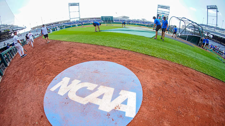 Jun 18, 2023; Omaha, NE, USA; An on-deck circle with the NCAA logo is pictured on the field before the game between the Virginia Cavaliers and the TCU Horned Frogs at Charles Schwab Field Omaha. Mandatory Credit: Dylan Widger-Imagn Images