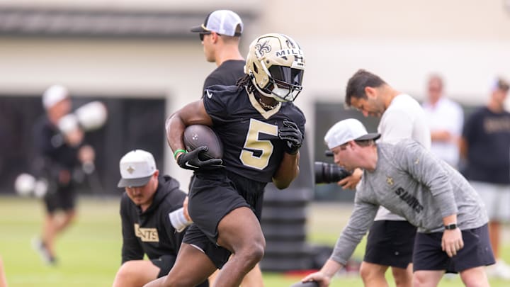 Jun 10, 2025; New Orleans, LA, USA;  New Orleans Saints running back Kendre Miller (5) runs running back drills during minicamp at Ochsner Sports Performance Center. Mandatory Credit: Stephen Lew-Imagn Images