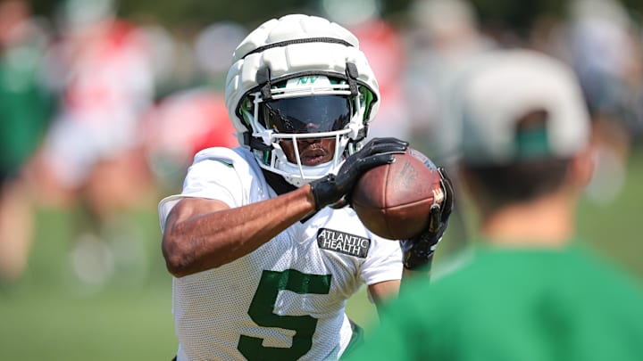 Jul 27, 2024; Florham Park, NJ, USA; New York Jets wide receiver Garrett Wilson (5) catches the ball during a drill during training camp at Atlantic Health Jets Training Center. Mandatory Credit: Vincent Carchietta-USA TODAY Sports