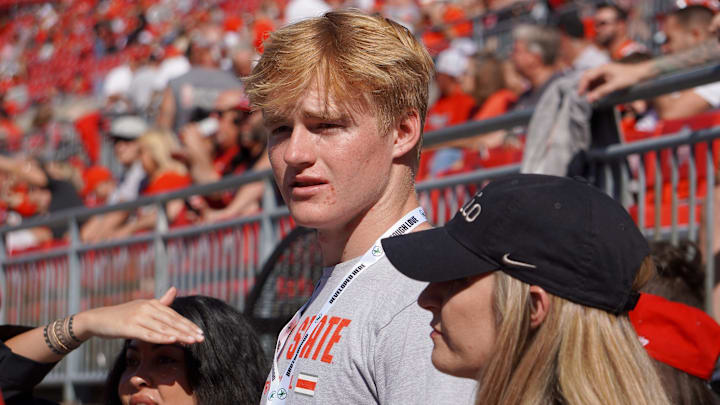 Oct 5, 2024; Columbus, OH, USA; Class of 2027 Huntington Beach, California, quarterback Brady Edmunds visits the field ahead of Ohio State's 35-7 win over the Iowa Hawkeyes after the NCAA football game at Ohio Stadium. Oct 5, 2024; Columbus, OH, USA; Class of 2027 Huntington Beach, California, quarterback Brady Edmunds visits the field ahead of Ohio State's 35-7 win over the Iowa Hawkeyes after the NCAA football game at Ohio Stadium.