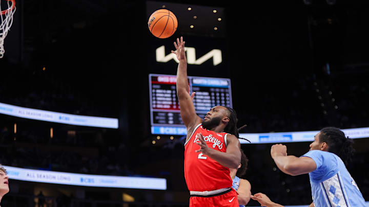 Dec 20, 2025; Atlanta, Georgia, USA; Ohio State Buckeyes guard Bruce Thornton (2) shoots against the North Carolina Tar Heels in the first half at State Farm Arena. Mandatory Credit: Brett Davis-Imagn Images
