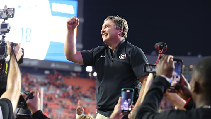 Oct 11, 2025; Auburn, Alabama, USA;  Georgia Bulldogs head coach Kirby Smart celebrates after the Bulldogs beat the Auburn Tigers at Jordan-Hare Stadium. Mandatory Credit: John Reed-Imagn Images