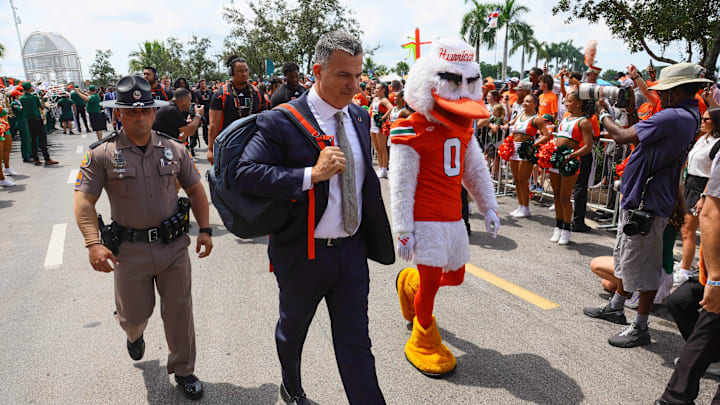 Sep 14, 2024; Miami Gardens, Florida, USA; Miami Hurricanes head coach Mario Cristobal arrives at Hard Rock Stadium before a game against the Ball State Cardinals. Mandatory Credit: Sam Navarro-Imagn Images