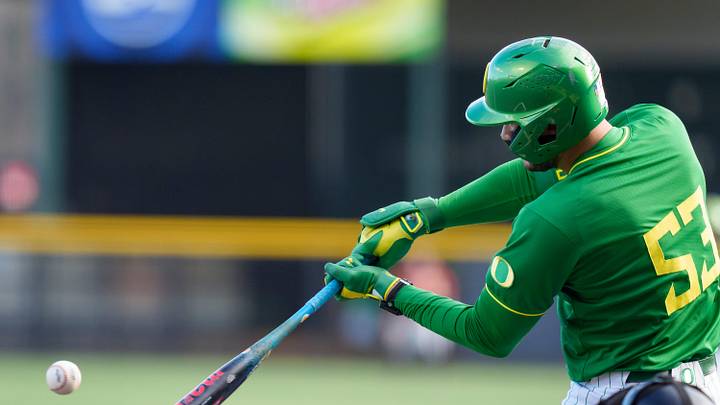 Oregon outfielder Angel Laya hits a single as the Oregon Ducks host the Youngstown State Penguins on Feb. 19, 2026, at PK Park in Eugene, Oregon.