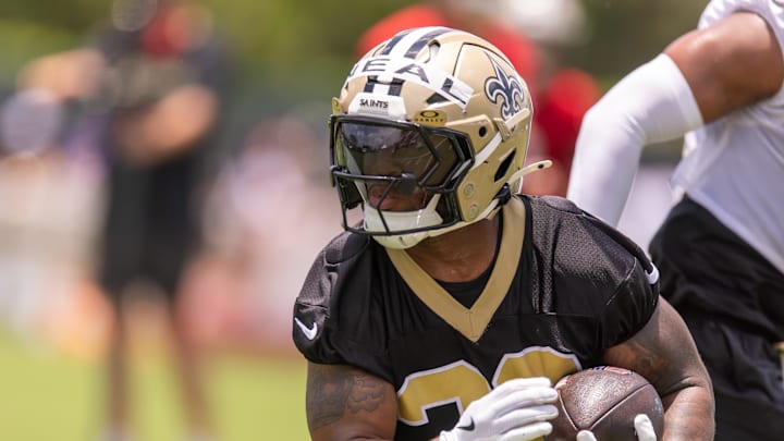 Jun 10, 2025; New Orleans, LA, USA;  New Orleans Saints running back Devin Neal (30) on running back drills during minicamp at Ochsner Sports Performance Center. Mandatory Credit: Stephen Lew-Imagn Images