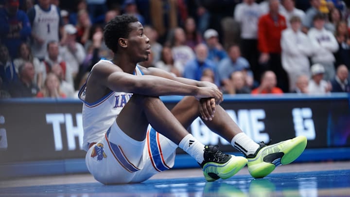 Kansas Jayhawks guard Melvin Council Jr. (14) sits down after a play against BYU Cougars during the game inside Allen Fieldhouse on Jan. 31, 2026. Kansas Jayhawks guard Melvin Council Jr. (14) sits down after a play against BYU Cougars during the game inside Allen Fieldhouse on Jan. 31, 2026.
