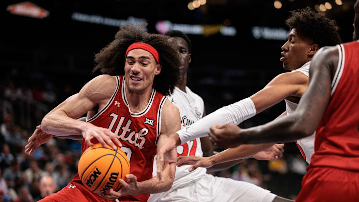 Mar 10, 2026; Kansas City, MO, USA; Utah Utes forward Keanu Dawes (8) rebounds during the first half against the Cincinnati Bearcats at T-Mobile Center. Mandatory Credit: William Purnell-Imagn Images