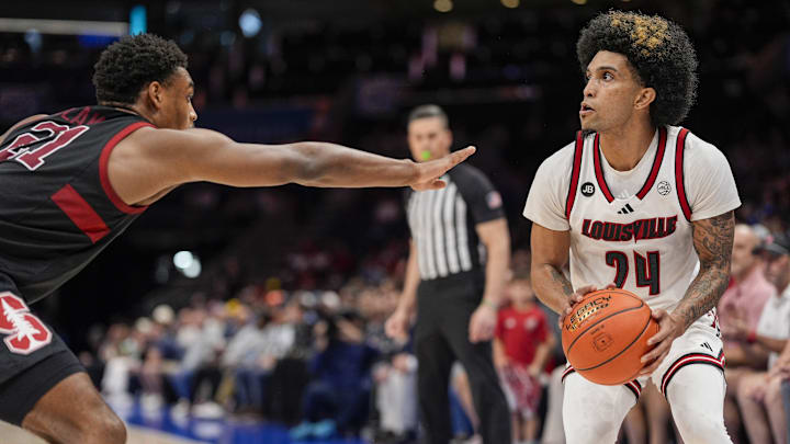 Louisville Cardinals guard Chucky Hepburn (24)