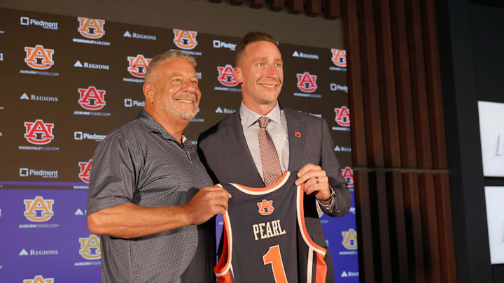 Sep 24, 2025; Auburn, AL, USA;  Auburn Tigers head basketball coach Steven Pearl and his father, former head coach Bruce Pearl, at his introductory news conference on Wednesday.  Mandatory Credit: John Reed-Imagn Images