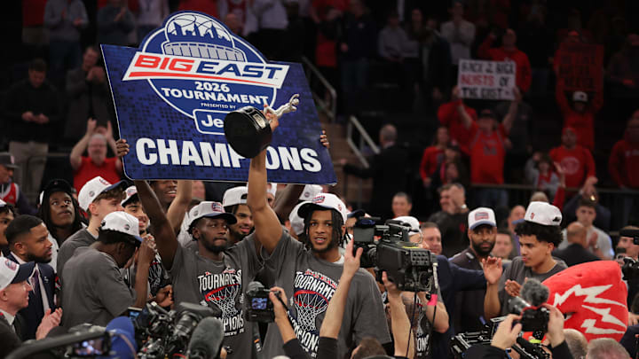 Mar 14, 2026; New York, NY, USA; SSt. John's Red Storm forward Zuby Ejiofor (24) hold the tournament’s most valuable player trophy following the men's Big East Conference Tournament Championship against the Connecticut Huskies at Madison Square Garden. Mandatory Credit: Brad Penner-Imagn Images