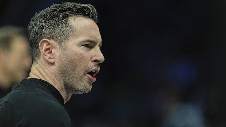 Jan 27, 2025; Charlotte, North Carolina, USA; Los Angeles Lakers head coach J.J. Reddick  during the first quarter against the Charlotte Hornets at the Spectrum Center. Mandatory Credit: Jim Dedmon-Imagn Images
