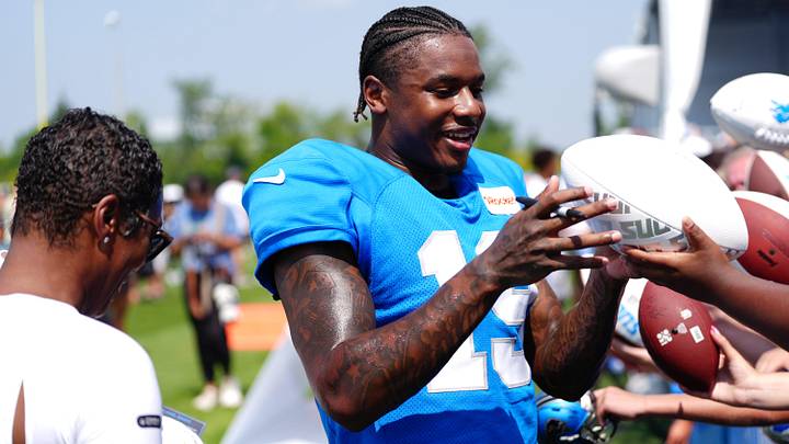 Detroit Lions Wr Dominic Lovett (19) signs autographs at the end of the joint practice with the Miami Dolphins at the Lions headquarters and training facility in Allen Park, Thursday, Aug. 14 2025