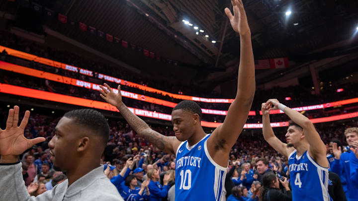 Dec 7, 2024; Seattle, Washington, USA;  Kentucky Wildcats forward Brandon Garrison (10) and guard Koby Brea (4) celebrate after a game against the Gonzaga Bulldogs at Climate Pledge Arena. Mandatory Credit: Stephen Brashear-Imagn Images