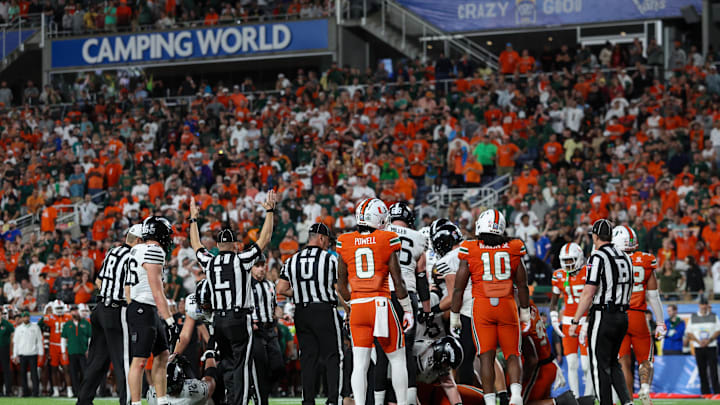 Dec 28, 2024; Orlando, FL, USA; Iowa State Cyclones quarterback Rocco Becht (3) scores a touchdown against the Miami Hurricanes in the fourth quarter during the Pop Tarts bowl at Camping World Stadium. Mandatory Credit: Nathan Ray Seebeck-Imagn Images