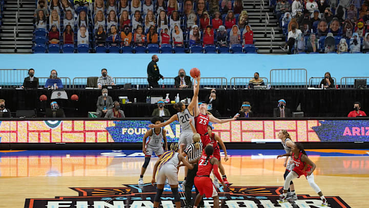 Apr 2, 2021; San Antonio, Texas, USA; A general overall view of the opening tipoff between Arizona Wildcats forward Cate Reese (25) and Connecticut Huskies forward Olivia Nelson-Ododa (20) on the FInal Four logo at Alamodome. Arizona defeated UConn 69-59. Mandatory Credit: Kirby Lee-USA TODAY Sports