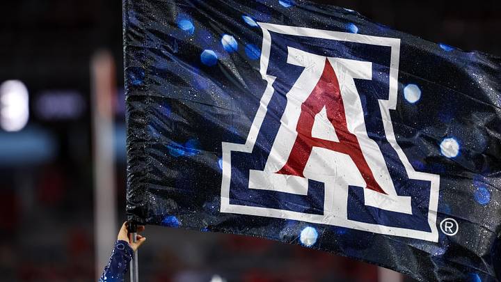 Sep 7, 2024; Tucson, Arizona, USA; Arizona Wildcats flag waves in the air right before a game against the Northern Arizona Lumberjacks at Arizona Stadium. Mandatory Credit: Aryanna Frank-Imagn Images