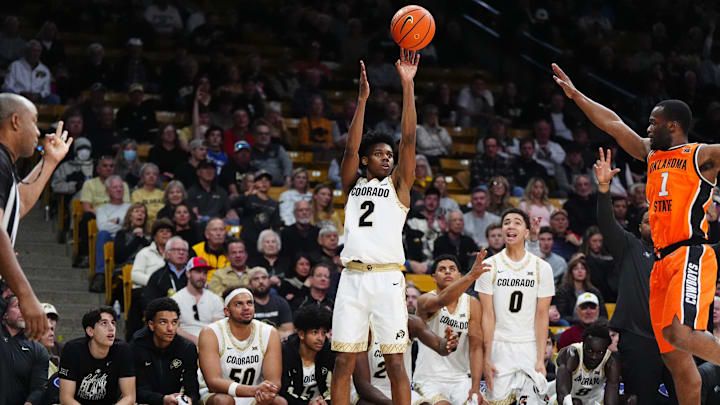 Feb 21, 2026; Boulder, Colorado, USA; Colorado Buffaloes guard Isaiah Johnson (2) releases the ball as Oklahoma State Cowboys guard Kanye Clary (1) defends in the second half at the CU Events Center. Mandatory Credit: Ron Chenoy-Imagn Images Feb 21, 2026; Boulder, Colorado, USA; Colorado Buffaloes guard Isaiah Johnson (2) releases the ball as Oklahoma State Cowboys guard Kanye Clary (1) defends in the second half at the CU Events Center. Mandatory Credit: Ron Chenoy-Imagn Images