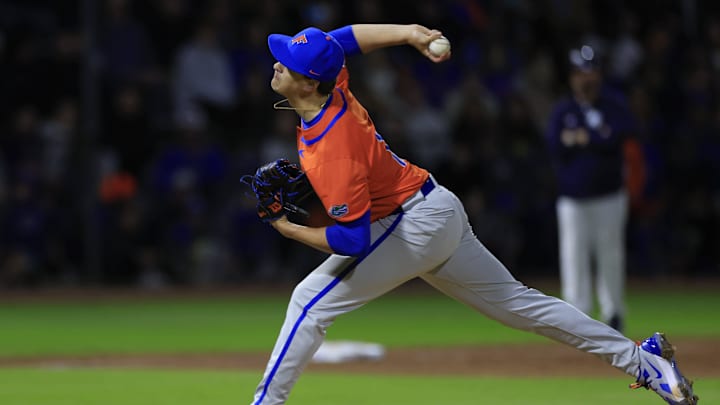 Florida pitcher Liam Peterson (12) pitches during the second inning of an NCAA baseball matchup