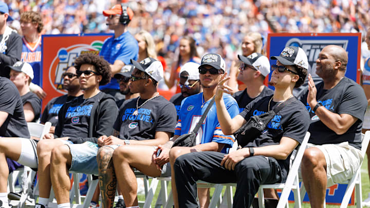 Apr 12, 2025; Gainesville, FL, USA; Florida Gators guard Will Richard (5) and Florida Gators guard Walter Clayton Jr. (1) gesture during the National Championship celebration at Ben Hill Griffin Stadium. Mandatory Credit: Matt Pendleton-Imagn Images