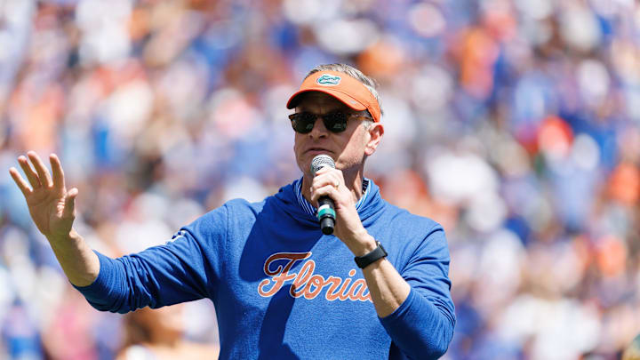 Apr 12, 2025; Gainesville, FL, USA; Florida Gators athletic director Scott Stricklin gestures towards the crowd during the National Championship celebration at Ben Hill Griffin Stadium. Mandatory Credit: Matt Pendleton-Imagn Images
