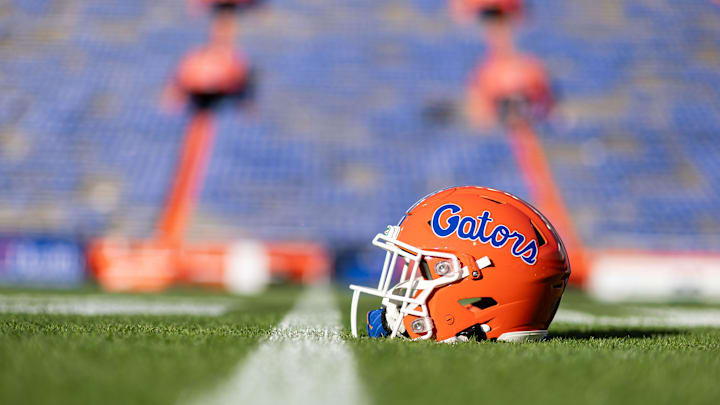 Nov 23, 2024; Gainesville, Florida, USA; A Florida Gators helmet sits on the field before a game against the Mississippi Rebels at Ben Hill Griffin Stadium. Mandatory Credit: Matt Pendleton-Imagn Images