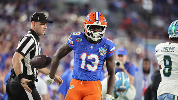 Dec 20, 2024; Tampa, FL, USA; Florida Gators running back Jadan Baugh (13) celebrates after he runs with the ball during the second half at Raymond James Stadium. Mandatory Credit: Kim Klement Neitzel-Imagn Images